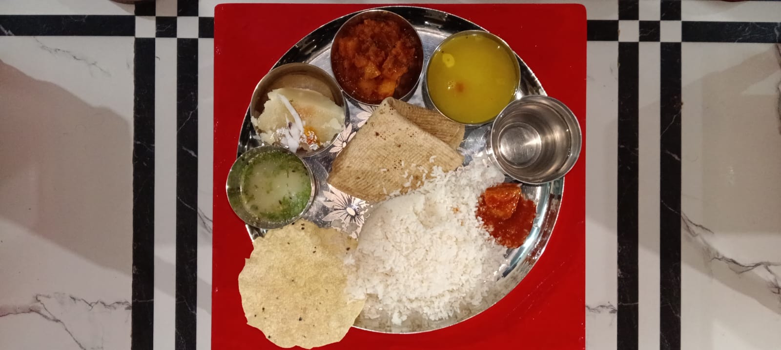 Complete nutritious lunch thali prepared with hygienic ingredients